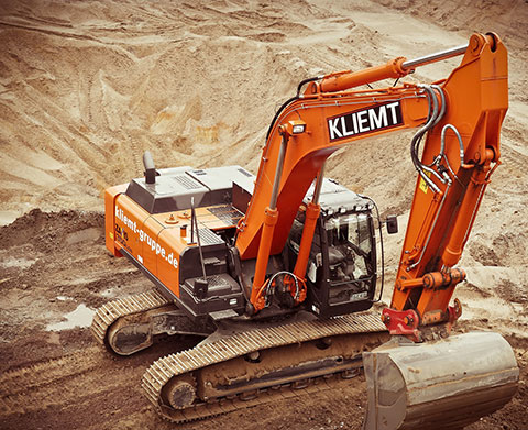 machine travaillant sur un chantier - livraison de fioul domestique chevreuse